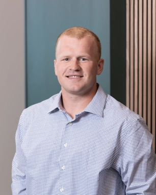 portrait of a smiling person in professional attire